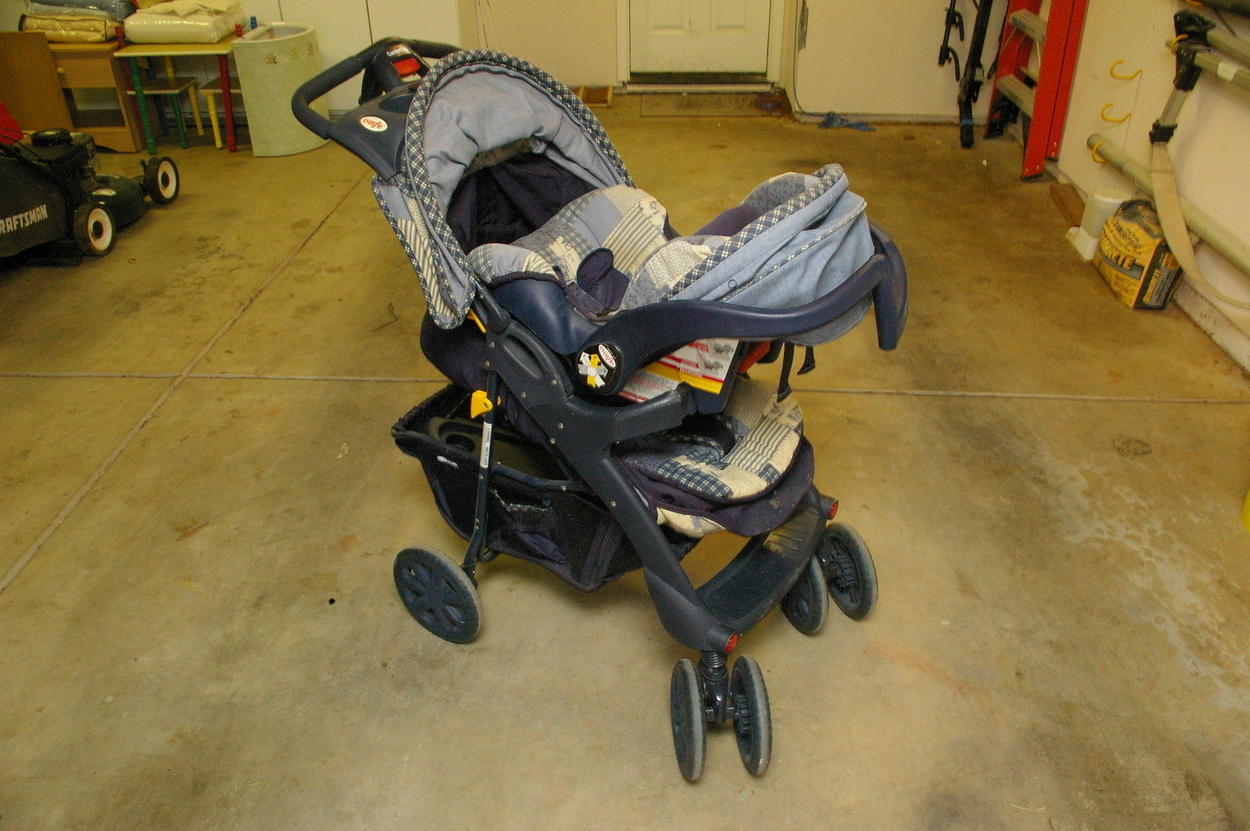 Osh Kosh/EvenFlo stroller
Shown with Infant carrier installed
