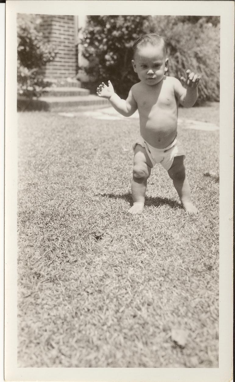 1 year old Dad on grass