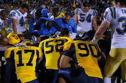 Post game prayer at center field for both teams