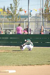 1st inning as pitcher - can't quite get his glove on a grounder to his left