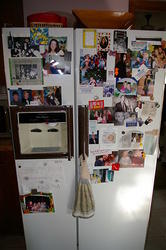 Grandma Barbara's fridge with pictures of all of her grandchildren